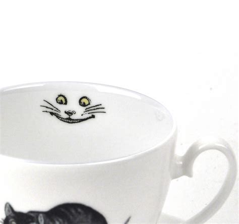 Cat Porcelain Teacup & Saucer .